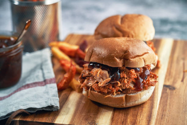 istock Pulled Chicken Burger Sandwich with Radish and Green Salad 2138870337