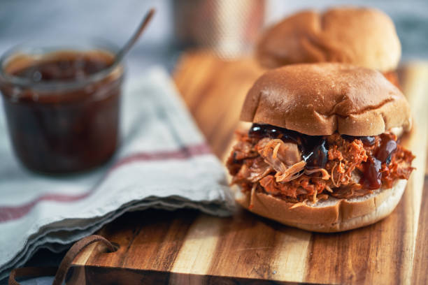 istock Pulled Chicken Burger Sandwich with Radish and Green Salad 2138870338