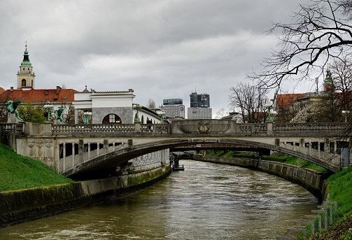 Ljubljana, Slovenia - March 29th 2024. A view of the famous Dragon Bridge in Ljubljana, under which the Ljubljanica River flows