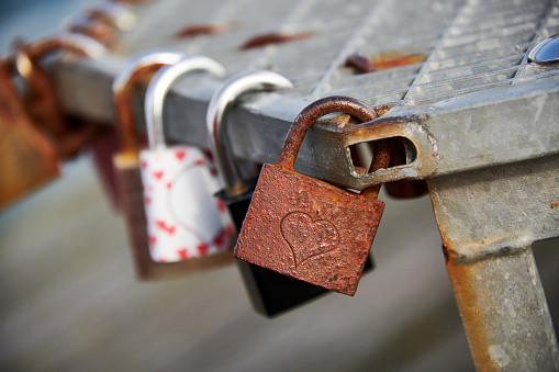 rusted lock with heart symbol