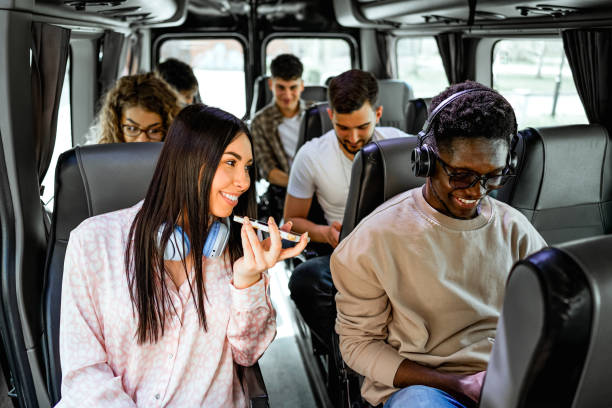 istock Young woman sending a voice message while riding the bus 2138893541