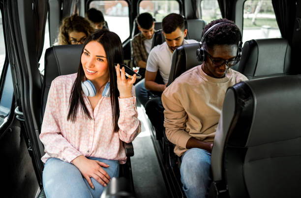 group of students in a travel bus - vocoder imagens e fotografias de stock