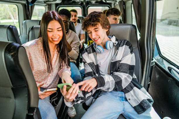 istock Group of students in a travel bus 2138897306