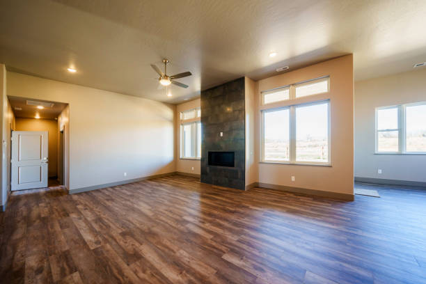 istock Living Room with Vaulted Ceilings in a Newly Built Modern Executive Home with Custom Fireplace, Picture Windows, Hardwood Floors 2138900452