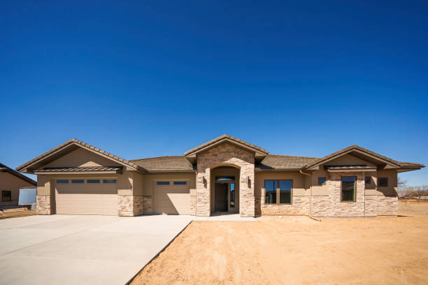 istock Drone View Exterior Newly Constructed Executive Modern Home with Stucco, Cultured Stone and Slate Roof 2138900998