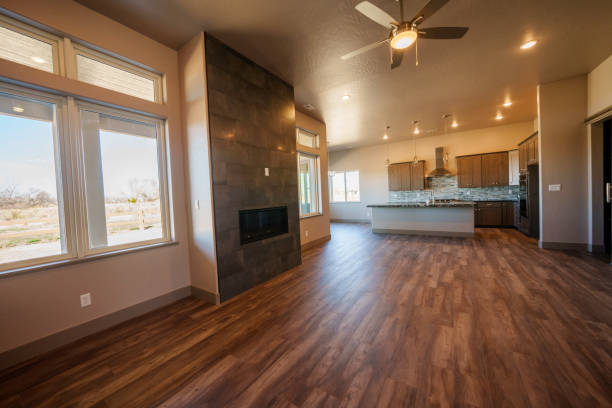 istock Wide Angle View of a Modern Executive Home Interior with Open Concept, Hardwood Floors, Designer Lighting and Granite Kitchen Counter Top 2138903122
