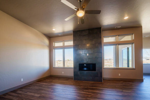 istock Living Room with Vaulted Ceilings in a Newly Built Modern Executive Home with Custom Fireplace, Picture Windows, Hardwood Floors 2138905352