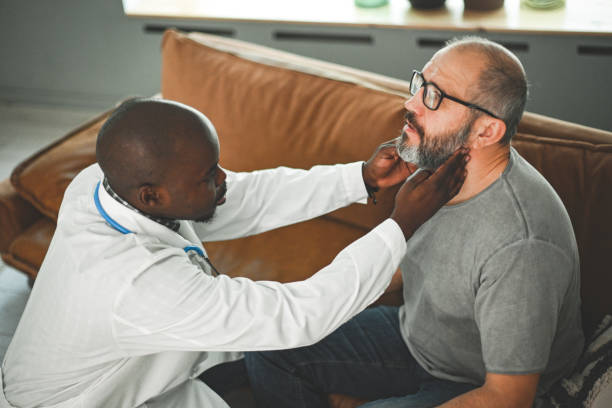 istock Doctor examining a patient 2138921965