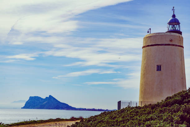 istock Lighthouse and Gibraltar rock, La Alcaidesa, Spain. 2138933167