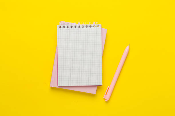 istock Notebooks with stationery on color background, top view 2138933191