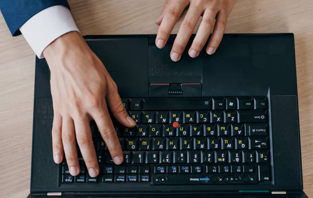 istock Desktop laptop work office technology training close-up Finance 2138942265