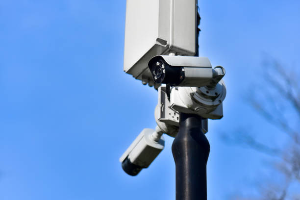 istock Street CCTV cameras on a pole against a blue sky 2138942674
