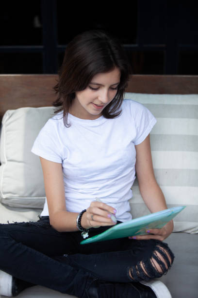 istock Happy little girl studying 2138960687