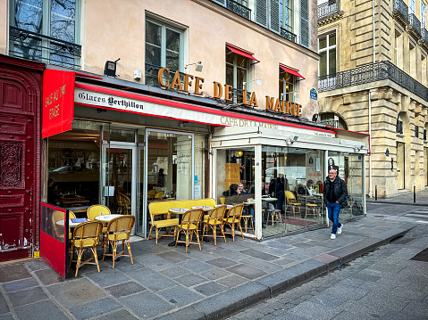 Paris, France - 20.02.2024. Café de la Mairie in front of Saint-Sulpice church in Paris. Rue Saint Sulpice