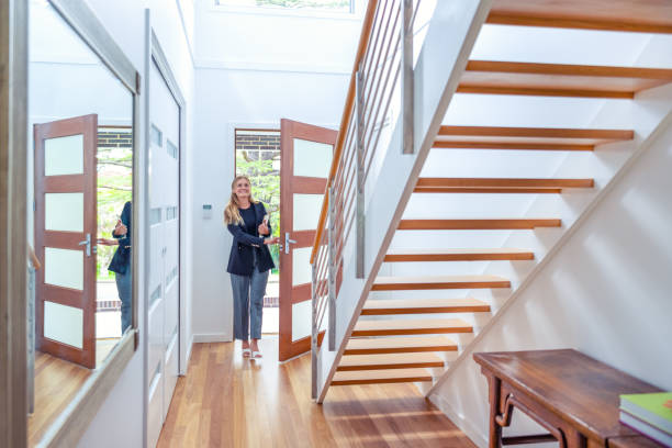 istock Real estate or insurance agent entering a house alone. 2139015996