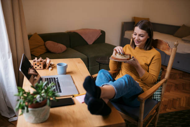 istock Female freelancer taking break from work at home 2139119761