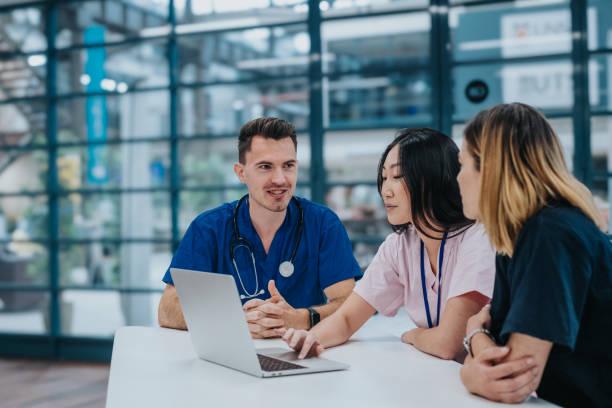 Female nurse leading team meeting