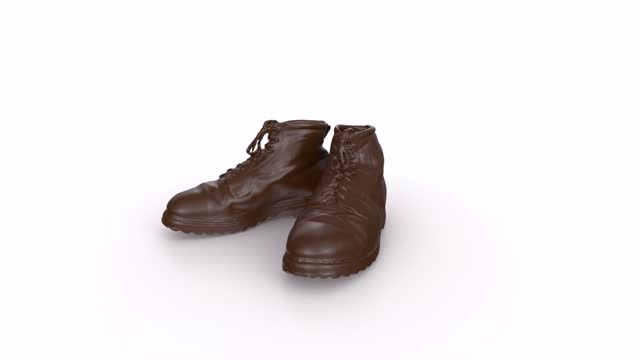 Brown Boots rotating in loop on white background