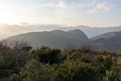 Mountain ranges and mist at sunset, Finale Liguria