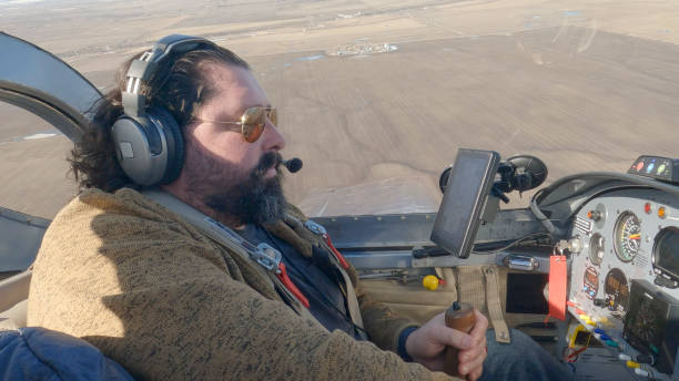 istock Portrait of pilot flying light aircraft 2139368468