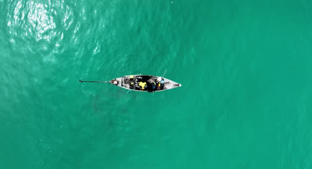 Top view fisherman boat in the tropical sea