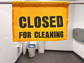 Closed for cleaning sign in public toilet