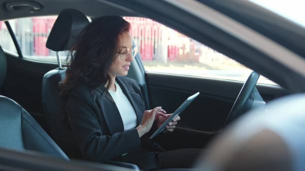 istock Beautiful lady in automobile ready to road 2139441367