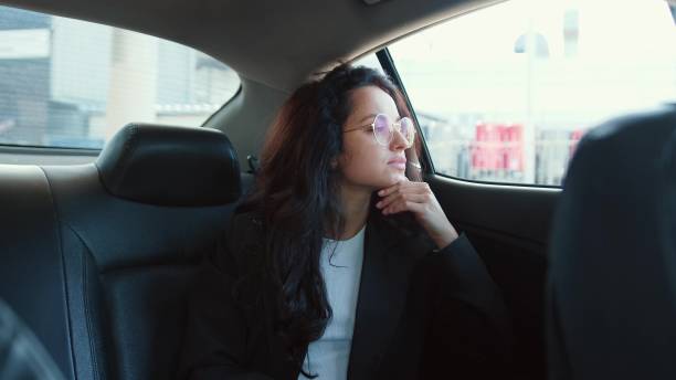 istock Woman in personal automobile ready to road 2139441392