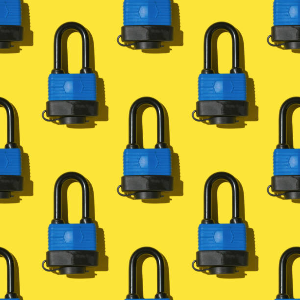 Seamless pattern of closed locks on a yellow background. Devices for the protection of premises.
