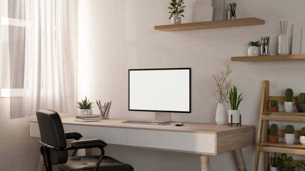 istock A contemporary, minimalist white home office with a computer mockup on a wooden desk. 2139584607