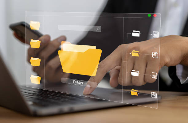 istock Human use laptop with online cloud document file management, information, system, DMS, online documentation database, manage files, enterprise with ERP.search and manage document business technology 2139639787