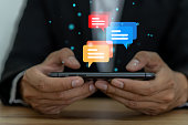 human-hand-using-smartphone-typing-live-chat-chatting-and-social-network-concepts-chatting.jpg?b=1&s=170x170&k=20&c=Odbp7AqQBgXWmwYdYT17hILEBNJkqrbyHP1MnzvbVcA=