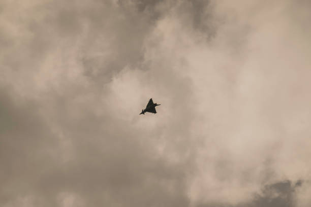 Three F 16 fighter plane on sunset