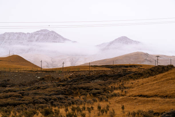 istock Snowy mountains and grasslands 2139837379