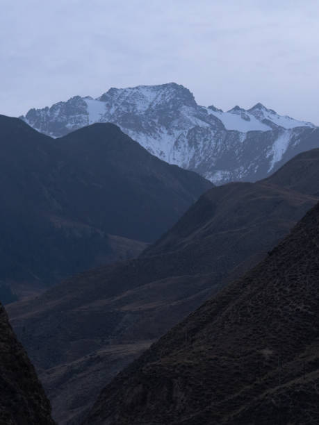 istock Photographing distant snowy mountains at night 2139837381