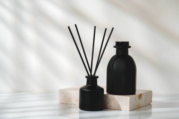 istock Elegant Aroma Diffuser With Black Reeds on a Marble Stand in Soft Daylight 2139892716