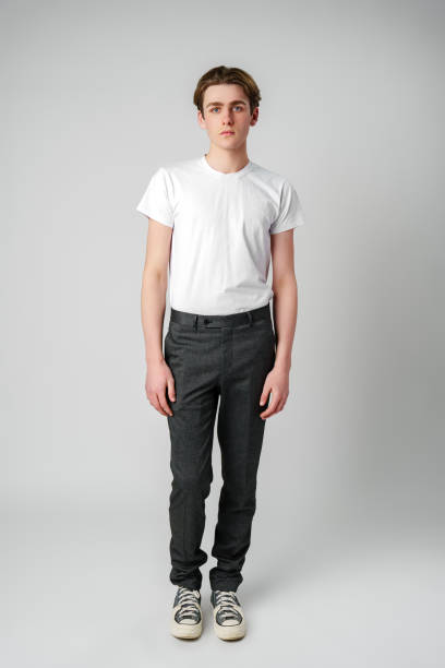 istock Young Man in White T-Shirt and Black Pants 2139898076