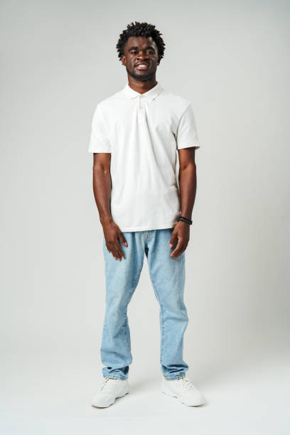 istock Man Standing in White Shirt and Jeans 2139909191
