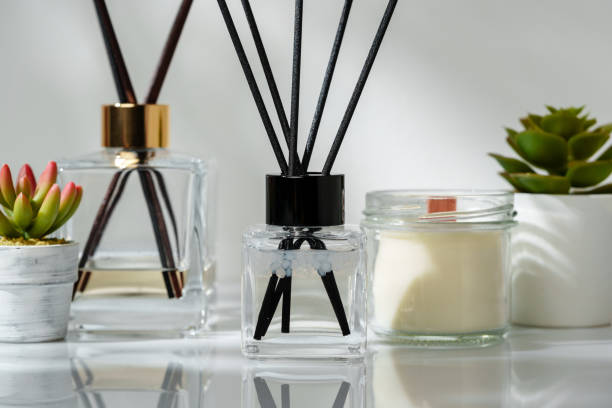 istock Elegant Home Fragrance Reed Diffuser Displayed Beside Scented Candles and Succulents 2139909199