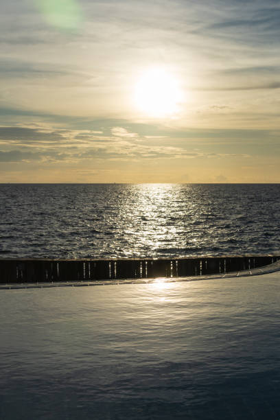 istock sunset by the sea 2139915045