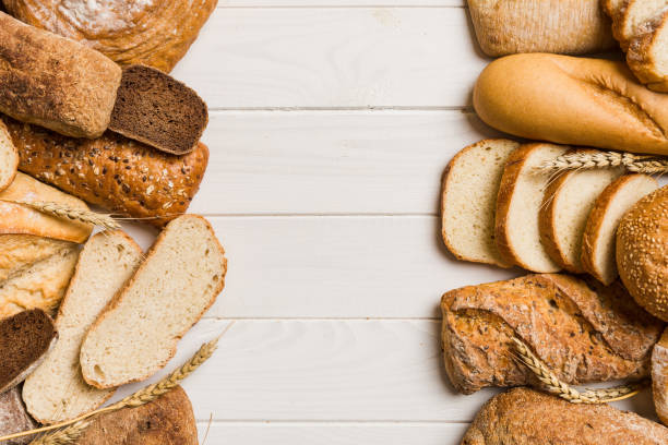 istock Homemade natural breads. Different kinds of fresh bread as background, top view with copy space 2139930581