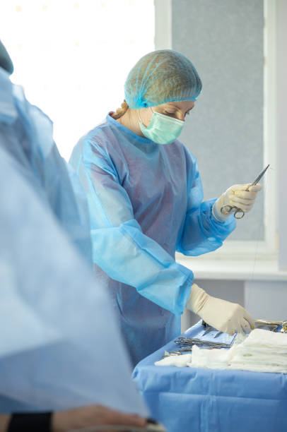 istock The nurse prepares surgical instruments for an operation. 2139941120