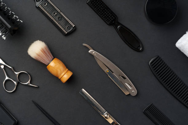 istock Variety of Hair Styling Tools and Accessories Displayed on a Dark Background 2139965657