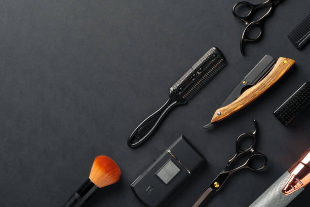 istock An Assortment of Professional Hairdressing Tools Laid Out on a Dark Surface 2139970585