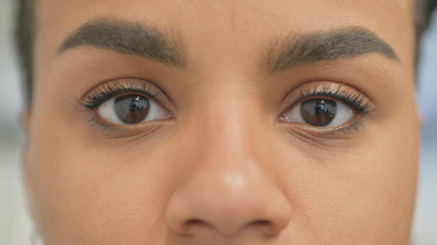 istock Close up of Female Blinking Eyes 2140020422