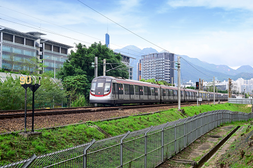 MTR Train Approaching tai po Station in Hong Kong - 04/04/2024 16:55:22 +0000