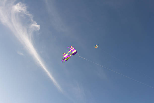 istock Minimalist image of two colored kites in a blue evening sky 2140131397