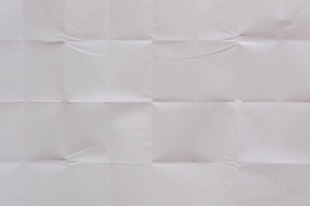 istock Close-up of White Folded Paper. Paper Texture. Background. 2140141615
