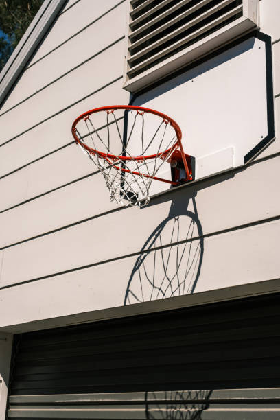 istock Basketball hoop on a wooden wall 2140151855