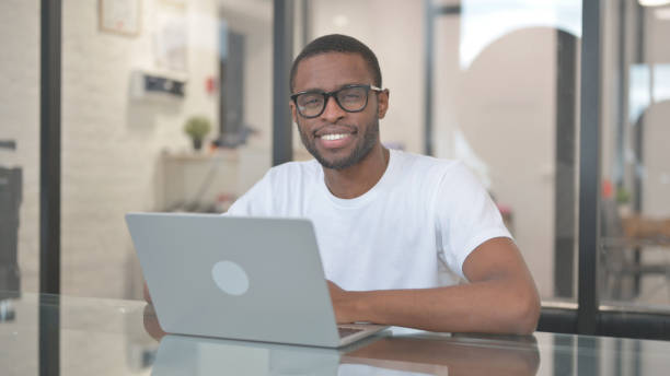 istock Smiling African American Man Looking at Camera in Office 2140172929